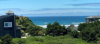 Ocean view, 100 yards to beach, pet friendly, secure fenced yard.