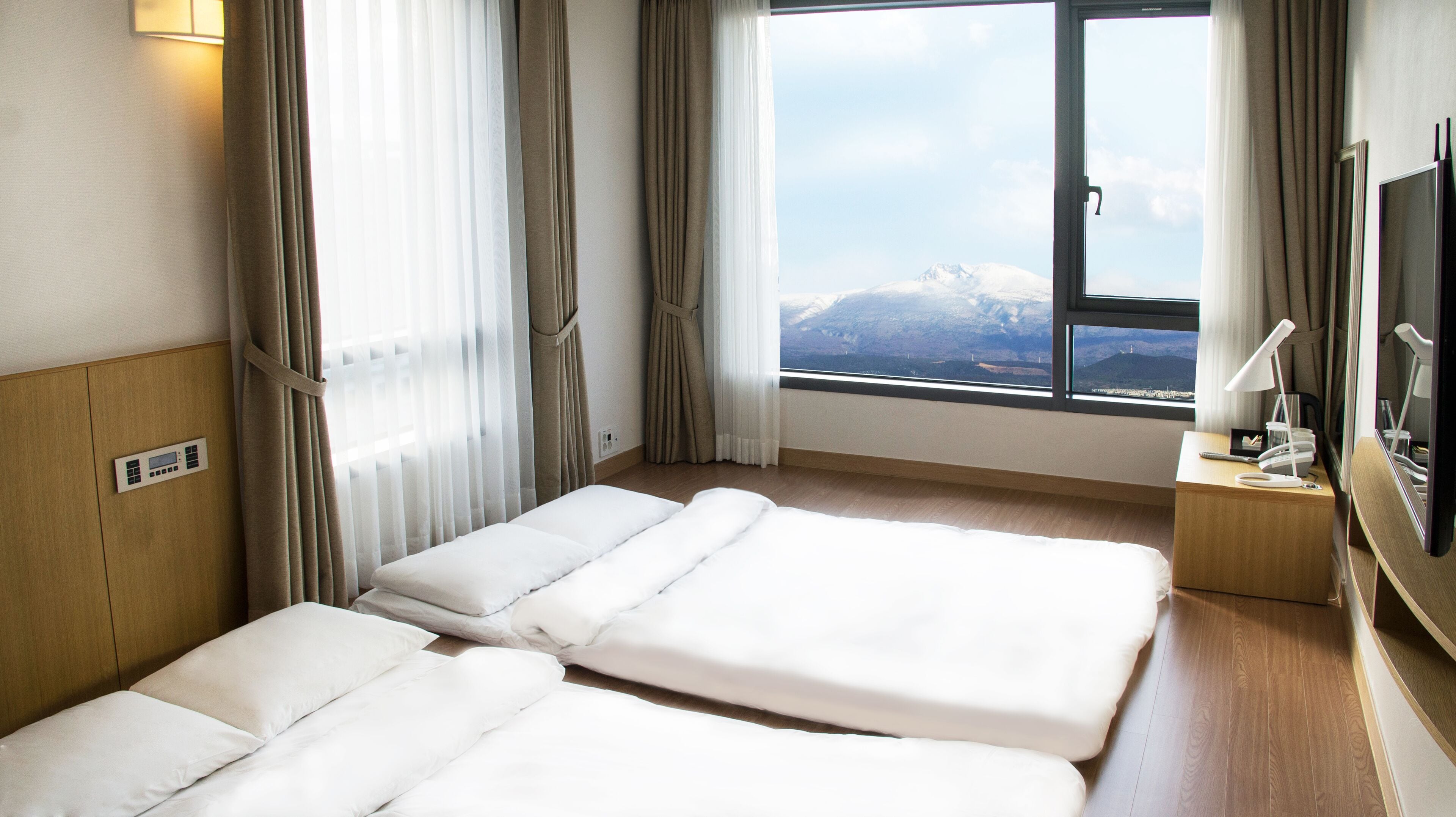 family room | desk, blackout curtains, soundproofing, iron/ironing board