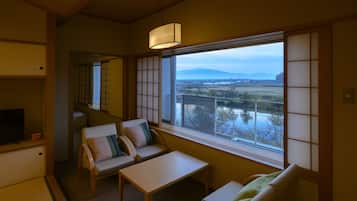 Barrier-free, 2-room Japanese-Western Room, Non-Smoking | Living area | Flat-screen TV