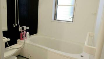 Villa | Bathroom | Hair dryer, slippers, towels, soap