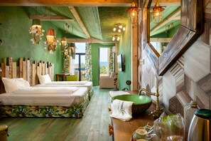 A bedroom with two beds, a green sink, and a view of the outdoors. - Hotel Casa Art (Troyan)