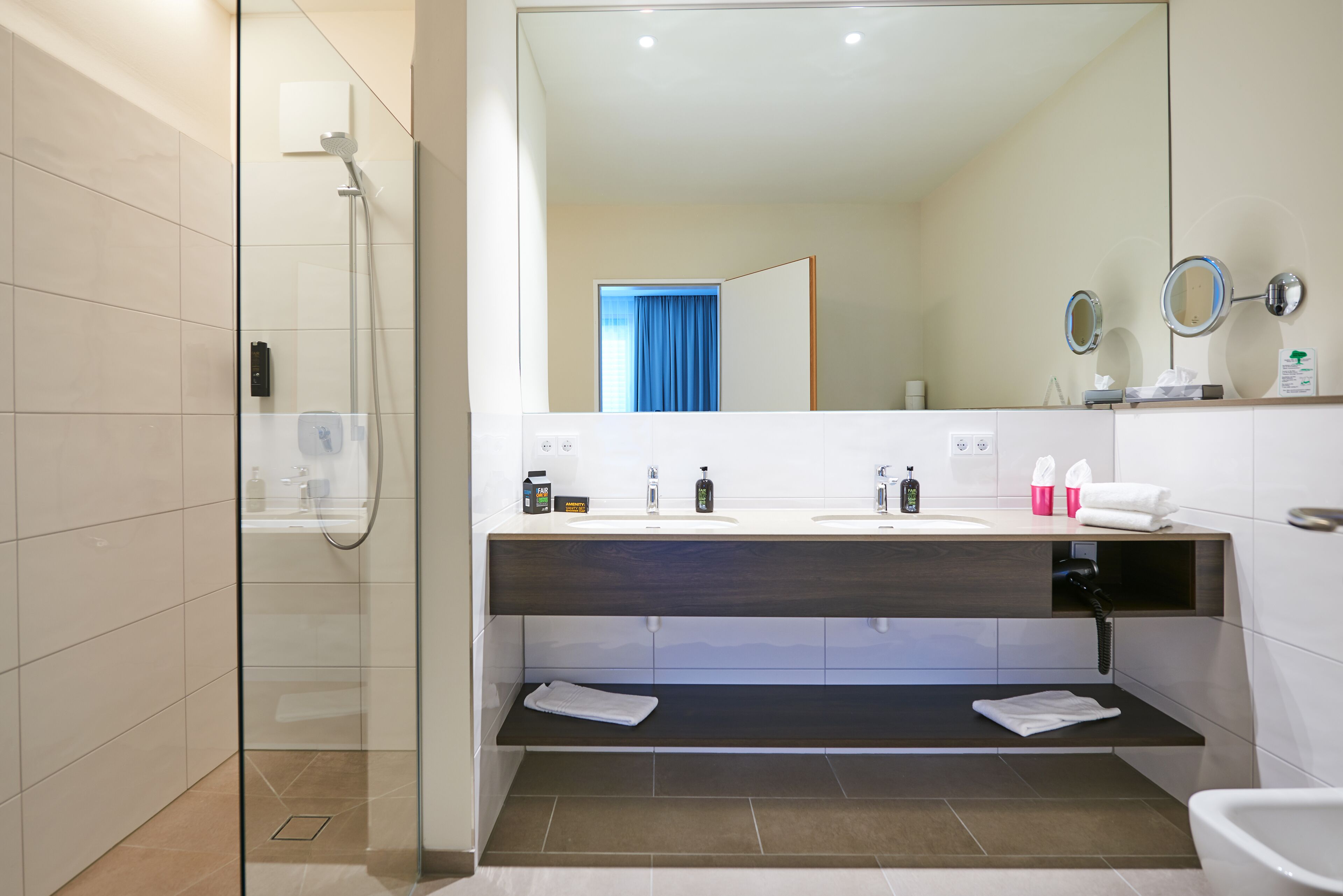 shower, free toiletries, hair dryer, slippers