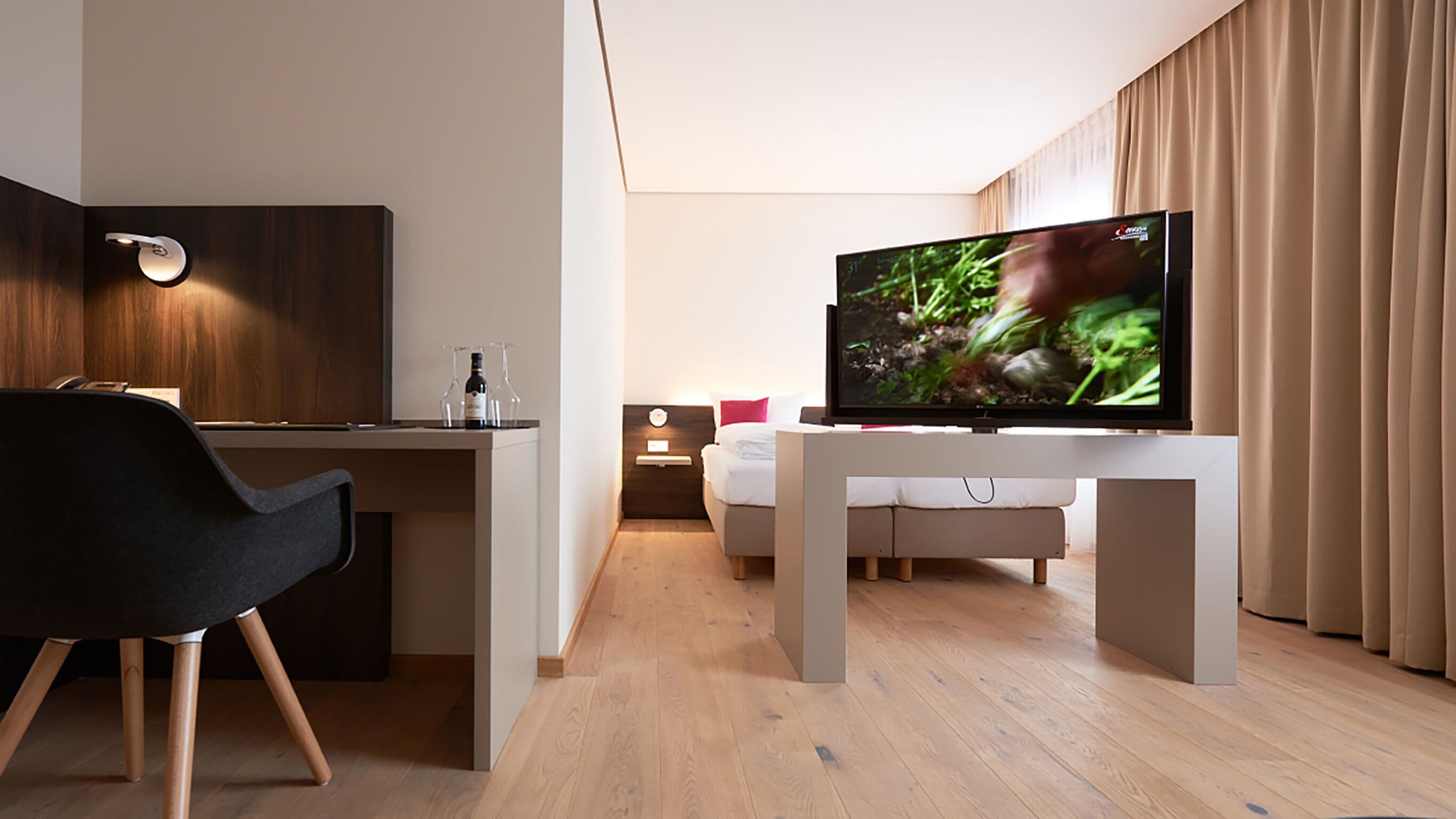 junior suite, 1 bedroom | living area | flat-screen tv, pay films