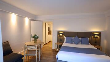 Standard Studio, Garden Area | 2 bedrooms, in-room safe, free WiFi, bed sheets