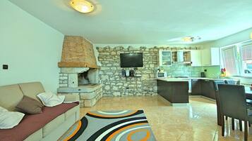 Ferienhaus | Wohnzimmer | Kamin