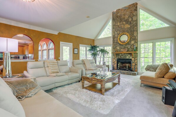 TV, fireplace, books