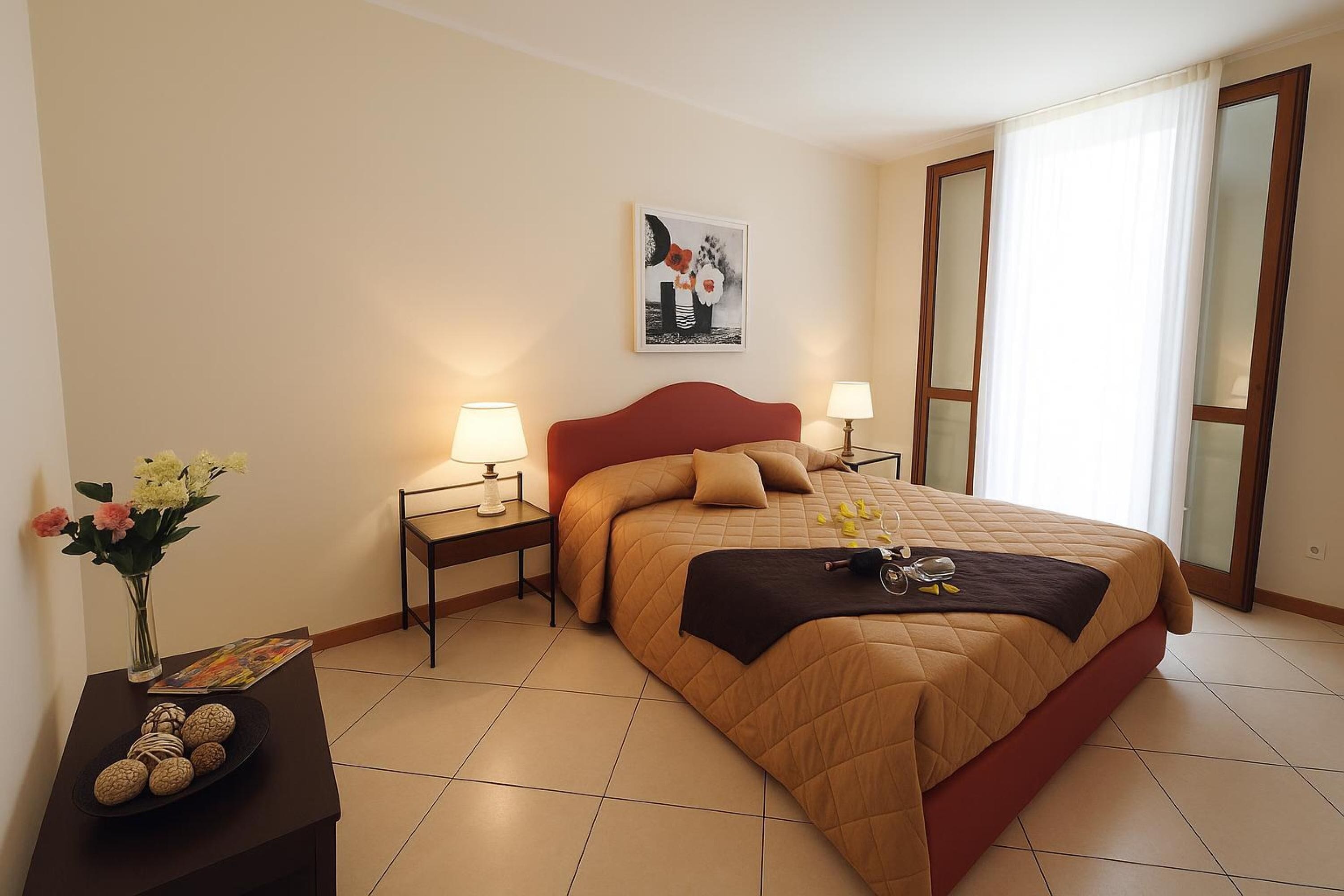 Departamento familiar, varias habitaciones, junto a la montaña (Residence Eden Azalea 2) | 1 habitación, tabla de planchar con plancha, wifi y ropa de cama 