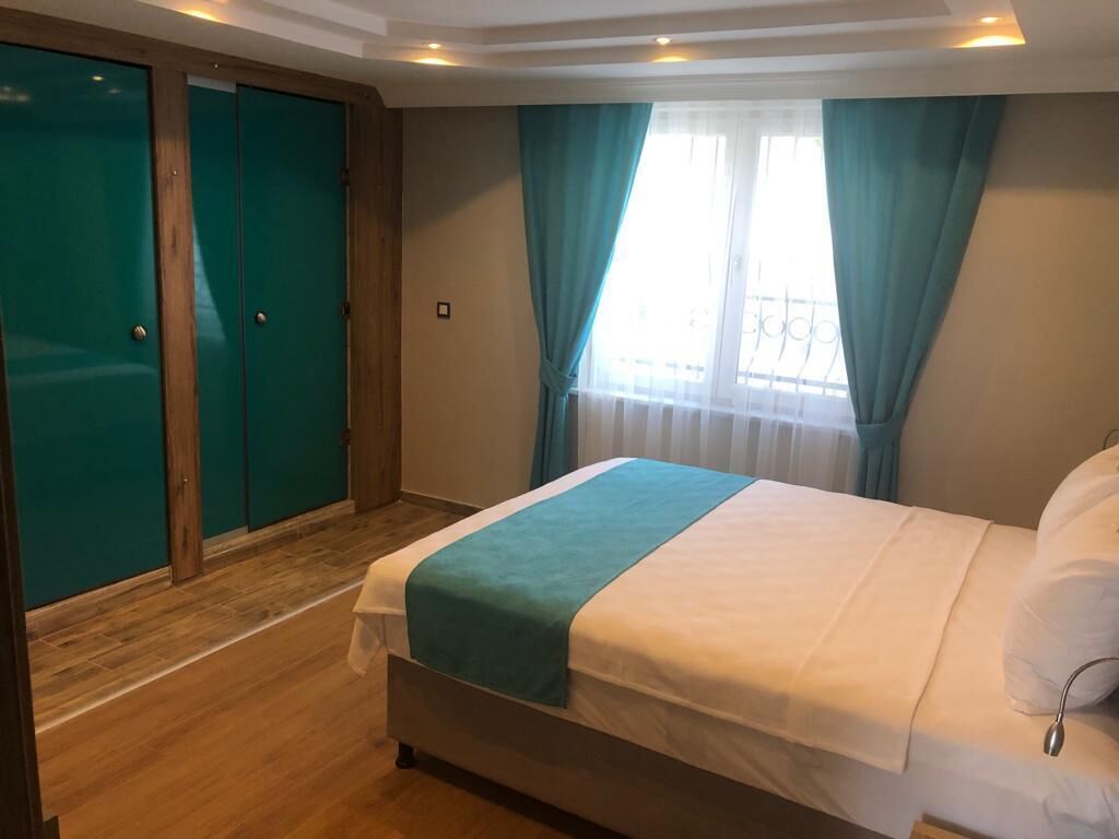 family double room | minibar, individually decorated, laptop workspace, free wifi