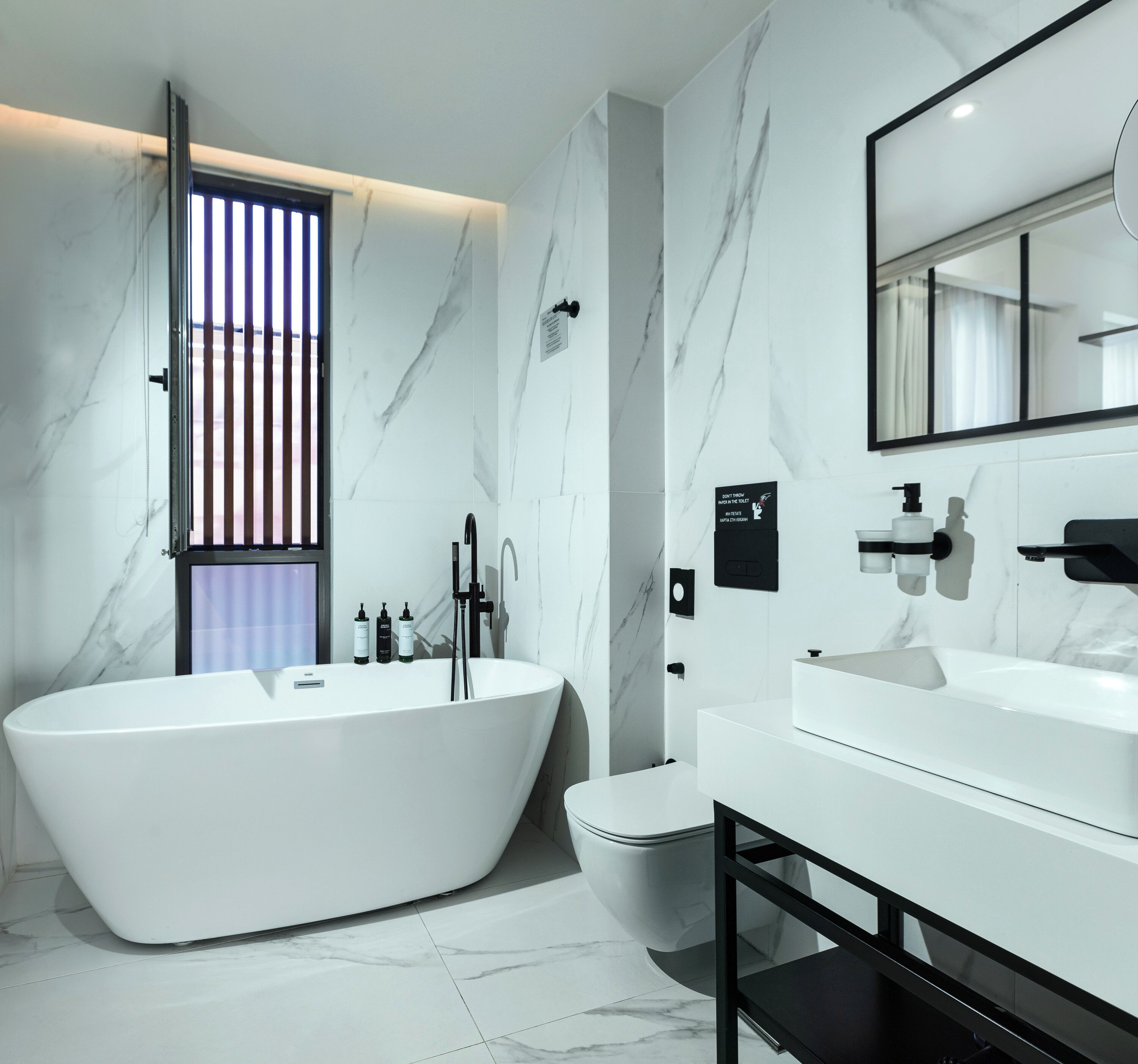 premium room with small balcony | bathroom | free toiletries, hair dryer, slippers, bidet