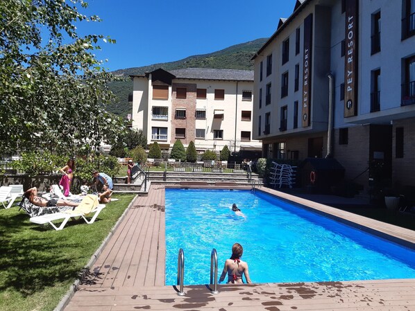 Seasonal outdoor pool, open 8:00 AM to 8:00 PM, sun loungers