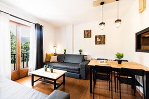 Superior Apartment | Living area | Flat-screen TV