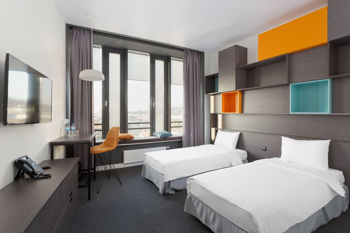 Standard-Doppel- oder -Zweibettzimmer | 1 Schlafzimmer, Schreibtisch, kostenloses WLAN, Bettwäsche