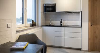 Home & Work Apartments