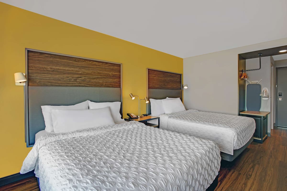 Room, 2 Queen Beds | In-room safe, iron/ironing board, free WiFi, bed sheets