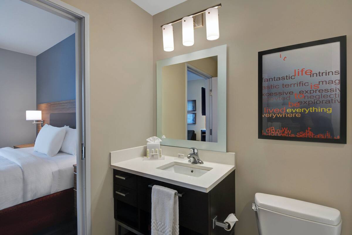 eco-friendly toiletries, hair dryer, towels, soap
