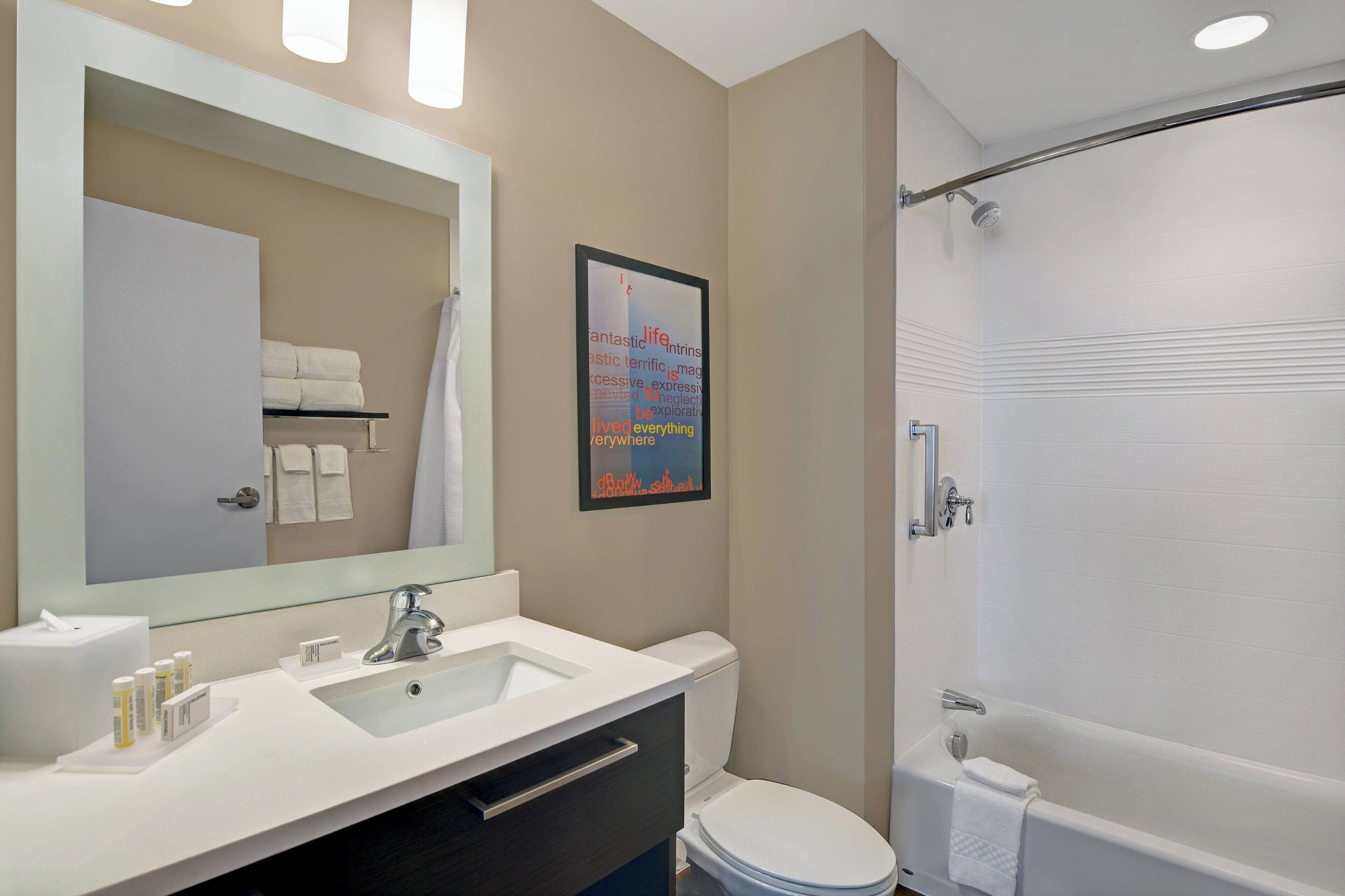 eco-friendly toiletries, hair dryer, towels, soap