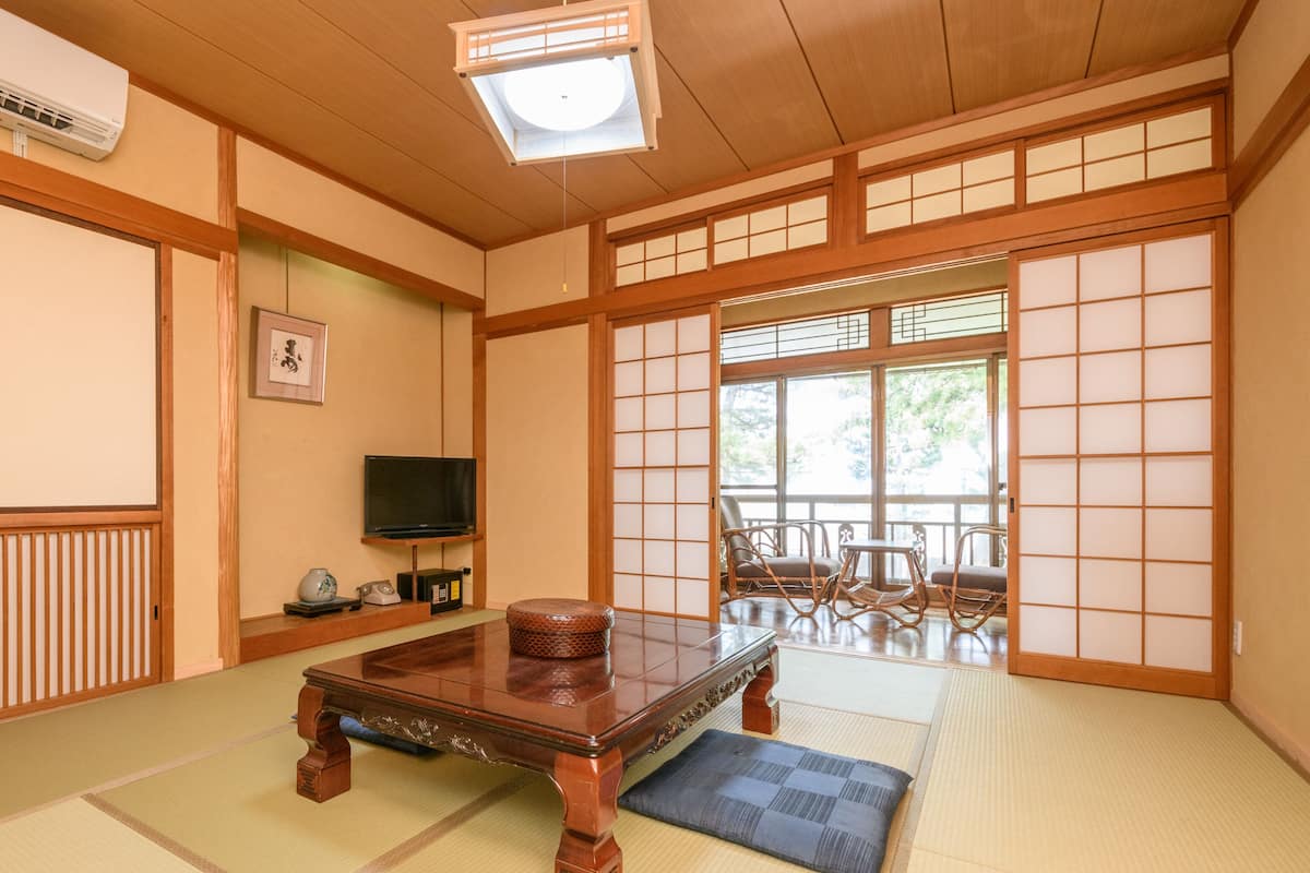 Japanese Quadruple Room with Shared Bathroom | Free WiFi, bed sheets