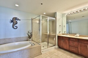 Combined shower/tub, hair dryer, towels, soap