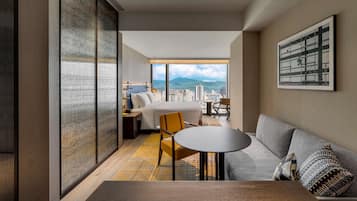 Premium Room, 1 King Bed | Living area | 55-inch Smart TV with satellite channels, TV