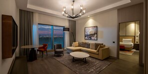 King One Bedroom Suite with Terrace | Living area | 55-inch LCD TV with satellite channels, TV