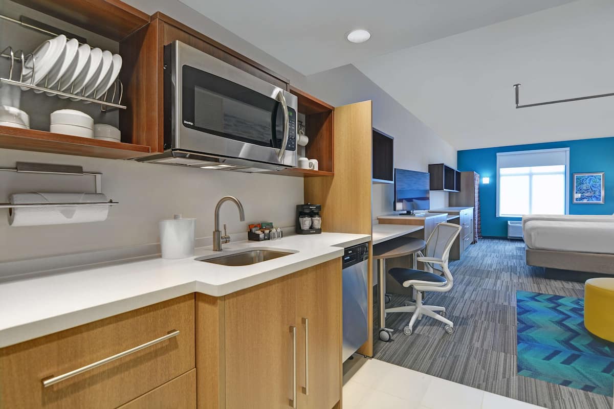 full-sized fridge, microwave, dishwasher, coffee/tea maker