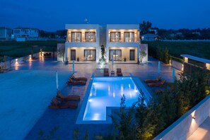 Seasonal outdoor pool, pool umbrellas, pool loungers