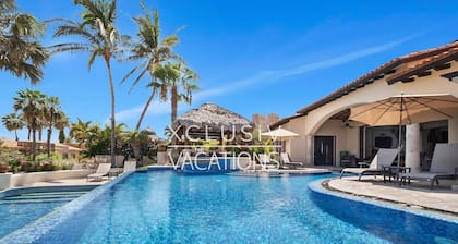 Ocean-view villa with golf cart, private beach club, and access to Esperanza* amenities. Private pool, AC, fast Wi-Fi, parking. XCLUSIV app for chef, transfers & activities + text concierge. 5+ nights: airport pickup & chef welcome. *Rules/fees apply