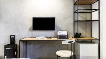 Desk, blackout drapes, soundproofing, free WiFi