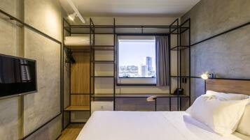 Apartamento, 1 cama de casal | Escrivaninha, cortinas blackout, quartos à prova de som