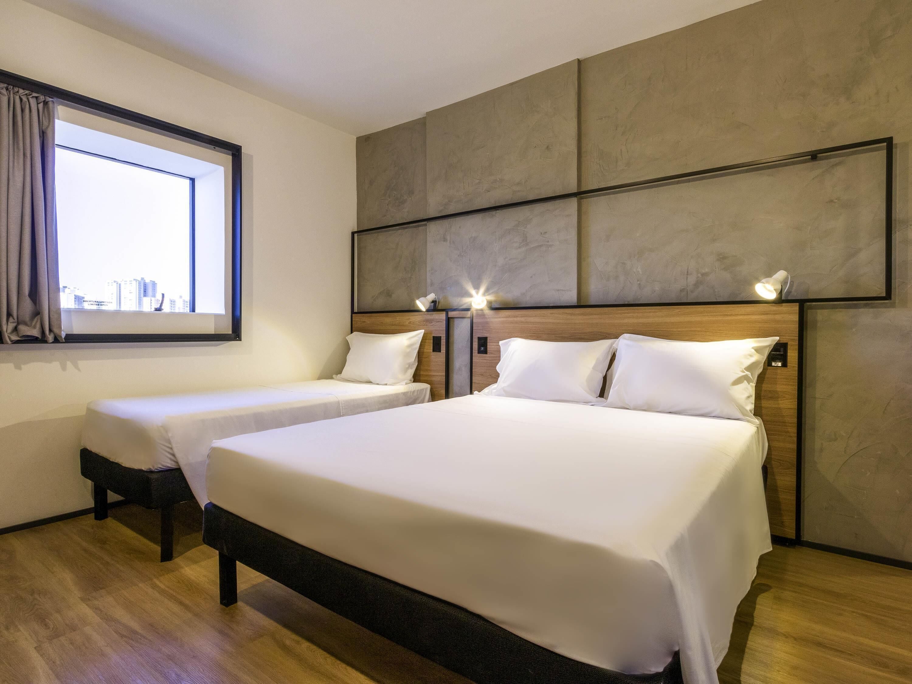 Apartamento, varias camas | Escritorio, cortinas opacas, sistema de insonorización y wifi gratis