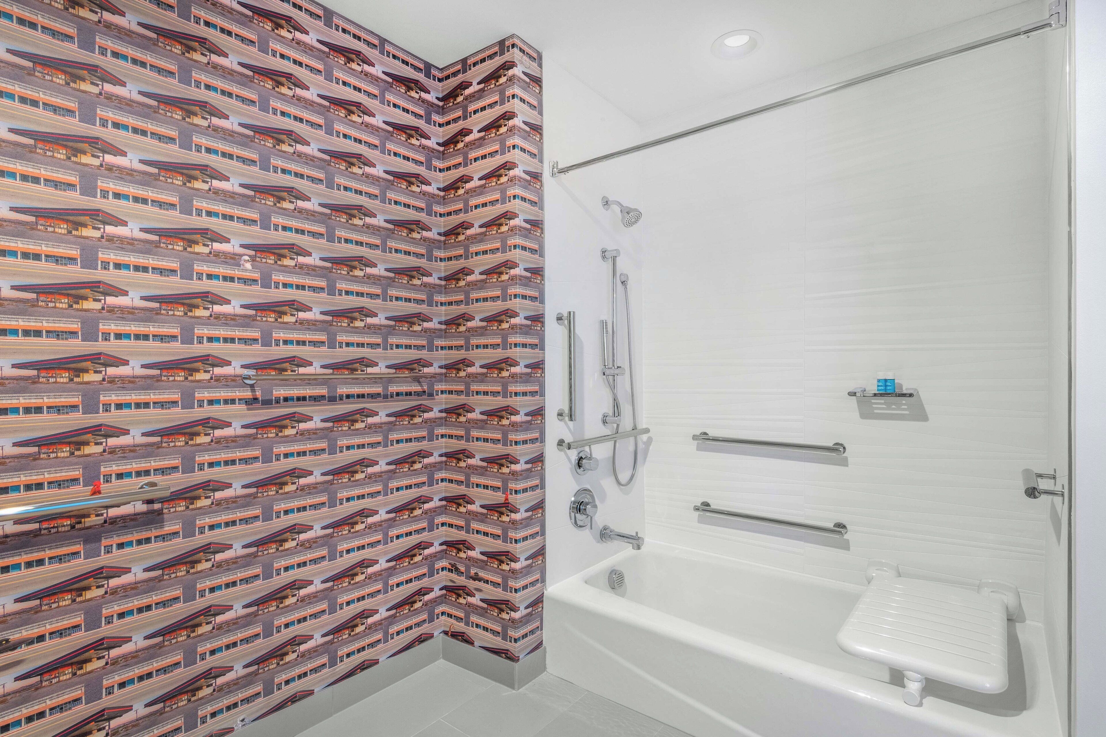 shower, rainfall showerhead, hair dryer, towels