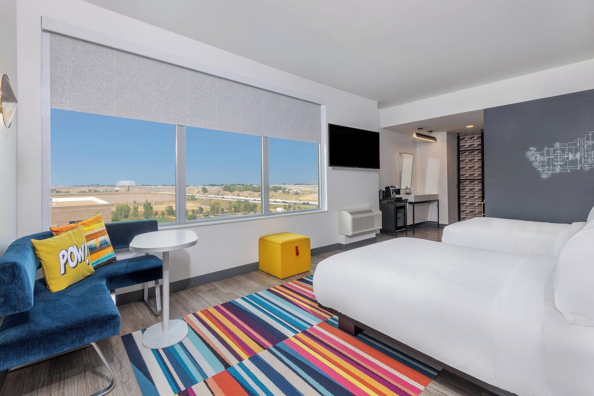 breezy, room, 2 queen beds | minibar, in-room safe, desk, laptop workspace