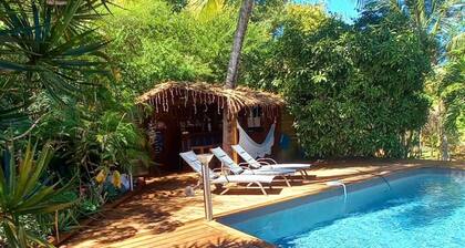 Atemoya lodges. Swimming pool, beach 400 m., Bamboo (2/4p), A/C, pool, beautiful garden, beach 400 m