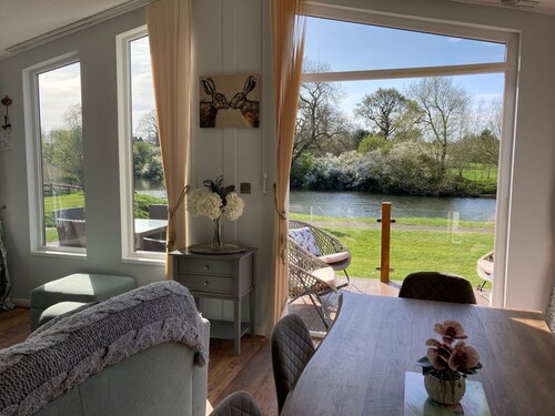 River Retreat Lodge is front line with panoramic views over the river Avon.