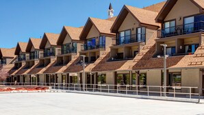 A row of hotel buildings with multiple balconies and large windows. - Steps to Shopping, Restaurants, Year-Round Recreation & More! Park City Resort Village 208 (Park City)