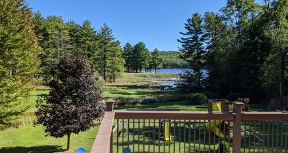 Level lakefront, family-friendly, hot tub, low fees, private dock