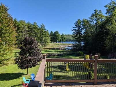 Level lakefront, family-friendly, hot tub, low fees, private dock