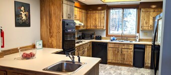 Level lakefront, family-friendly, hot tub, low fees, private dock