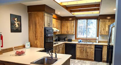 Level lakefront, family-friendly, hot tub, low fees, private dock