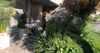 Rest House in a very secure Condo for families rounded by natural areas