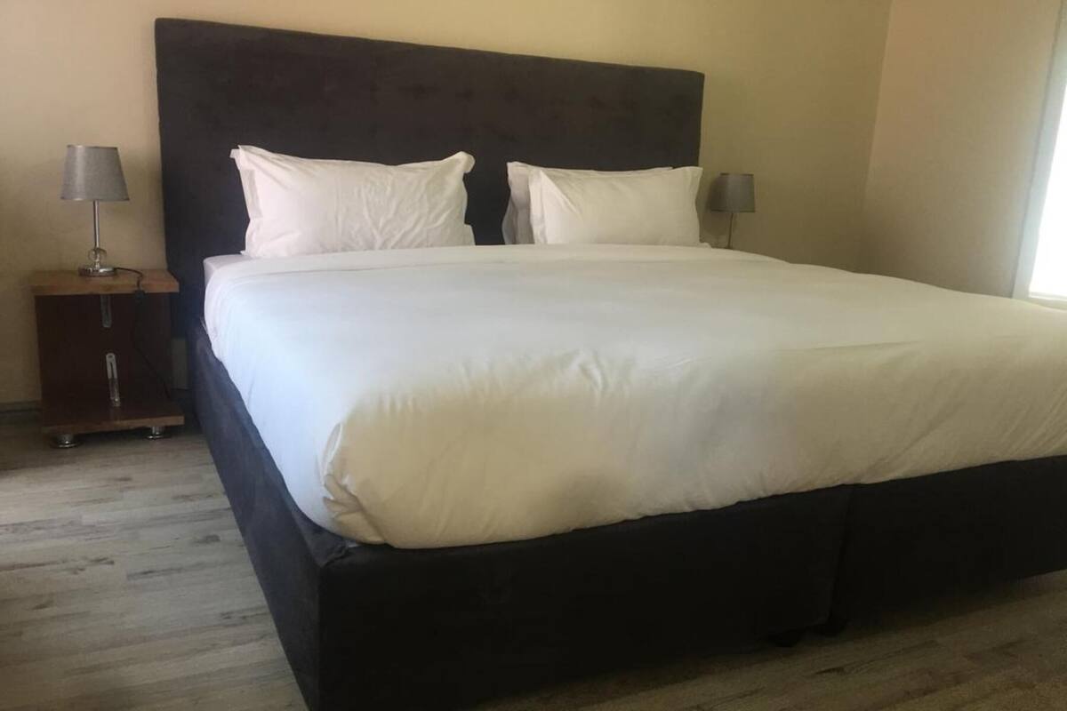 Desk, blackout drapes, iron/ironing board (on request), WiFi (free)