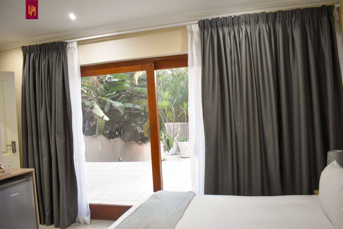 Desk, blackout drapes, iron/ironing board (on request), WiFi (free)
