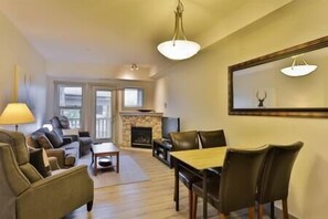 TV, fireplace - Mountain View Two Queens Condo (Fernie)