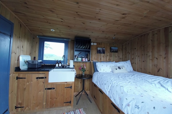 1 bedroom, blackout drapes, bed sheets
