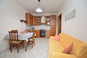 Appartement, 1 chambre | Aire de séjour