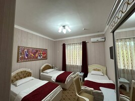 Standard Triple Room | Premium bedding, down comforters, minibar, in-room safe