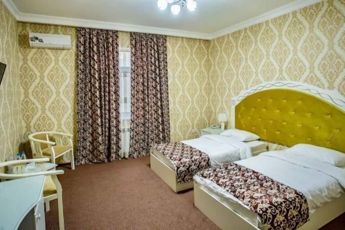 Premium bedding, down duvets, minibar, in-room safe