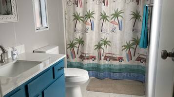 Combined shower/tub, eco-friendly toiletries, hair dryer, towels