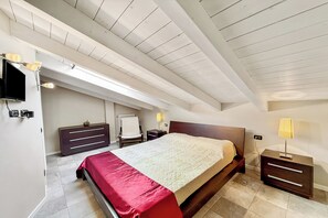 Family Apartment, Multiple Bedrooms, 2 Bathrooms, Mountainside (Mansarda di Pianello) | 2 bedrooms, WiFi, bed sheets