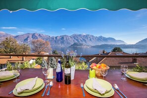 Familjelägenhet - flera sovrum - 2 badrum - intill bergen (Cadenabbia Fantastico) | Restaurang utomhus